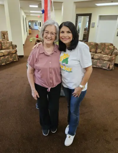 Senior advisor with happy assisted living resident | New Day Lifestyle for Seniors
