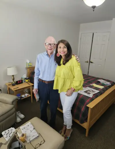 Senior resident with advisor in assisted living suite | New Day Lifestyle for Seniors