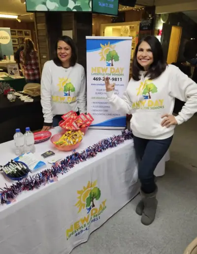 Mimi hosting a New Day Senior Care community outreach booth | New Day Lifestyle for Seniors