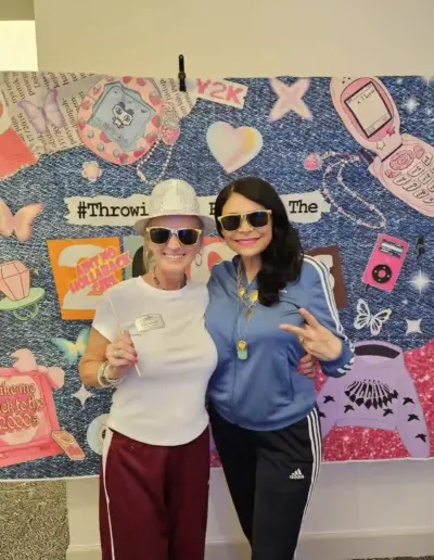 Senior care advisor Mimi Bowie and Elizabeth at a Y2K theme party | New Day Lifestyle for Seniors