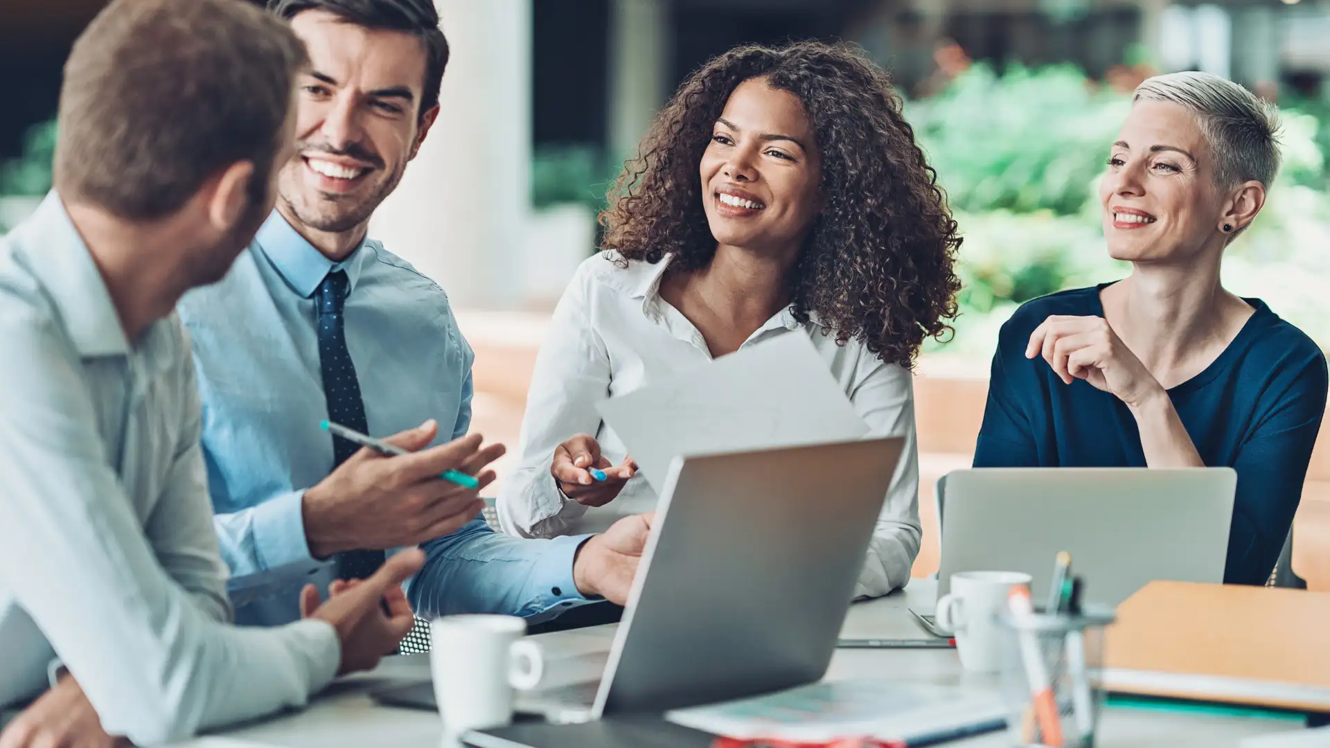 Senior care business consultants collaborating in a professional strategy meeting | New Day Lifestyle for Seniors 
